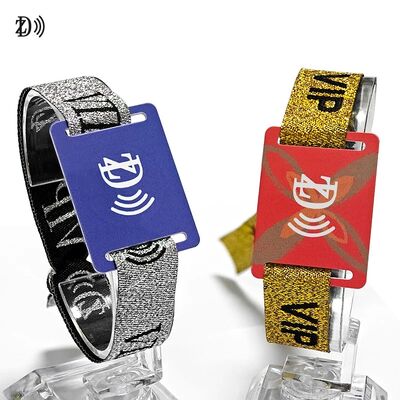 NFC personalizzato 13.56MHz Fascia da polso in tessuto usa e getta S50 chip Braccialetto RFID per il controllo dell'accesso agli eventi